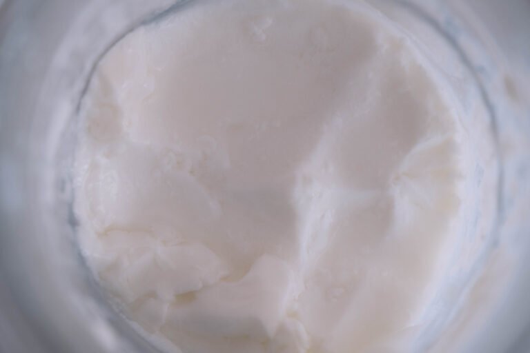 A closeup of a jar of heirloom mesophilic yogurt